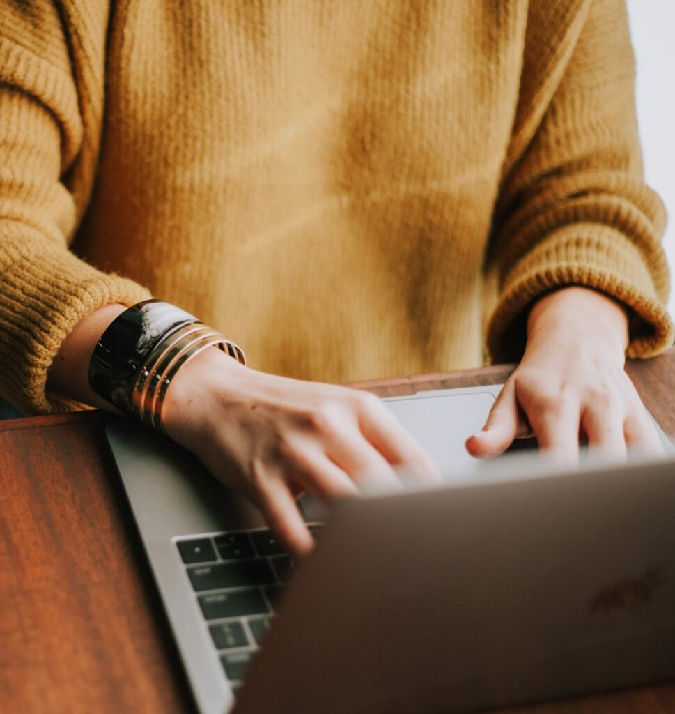 person using laptop computer